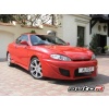 Hyundai Coupe - przedni zderzak / front bumper - HUC-F-01